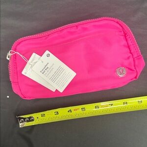 lululemon athletica Hot Pink Everyday Pouch with Silver Logo